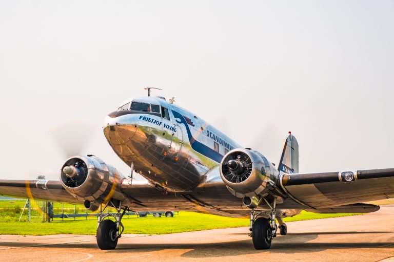 Vintage Douglas DC-3 propellor airplane ready for take off